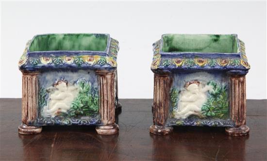 A pair of Palissy style square cache pots, 19th century, height 7.5cm